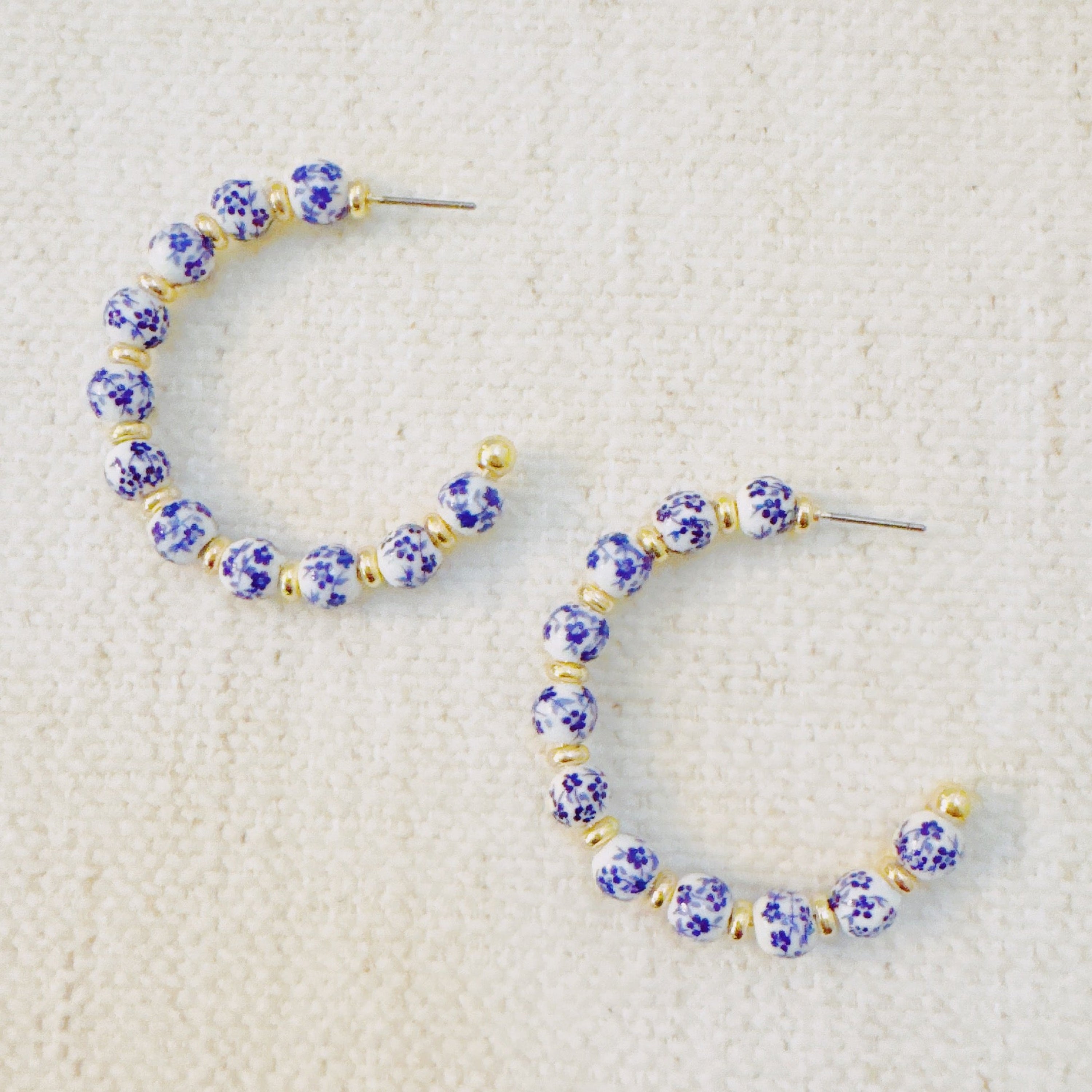 Blue Bloom Floral Hoop Earrings – Elegant Hoops with Soft Blue Flower