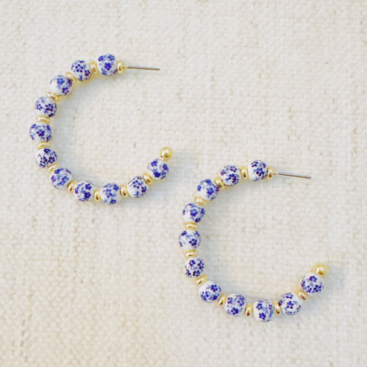 Blue Bloom Floral Hoop Earrings – Elegant Hoops with Soft Blue Flower