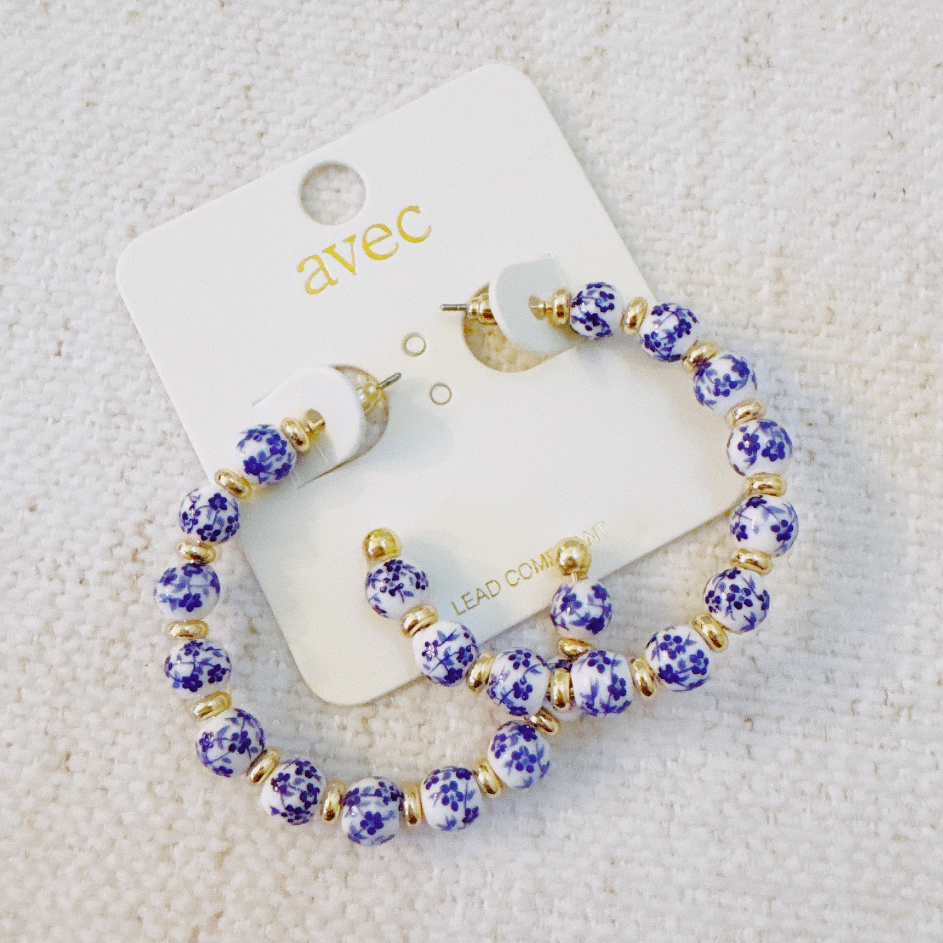 Blue Bloom Floral Hoop Earrings – Elegant Hoops with Soft Blue Flower