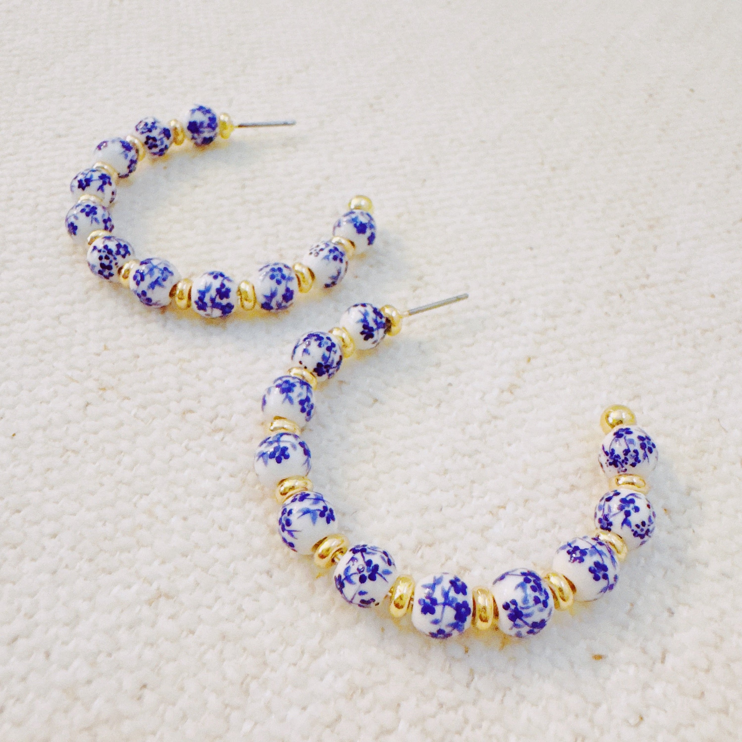 Blue Bloom Floral Hoop Earrings – Elegant Hoops with Soft Blue Flower