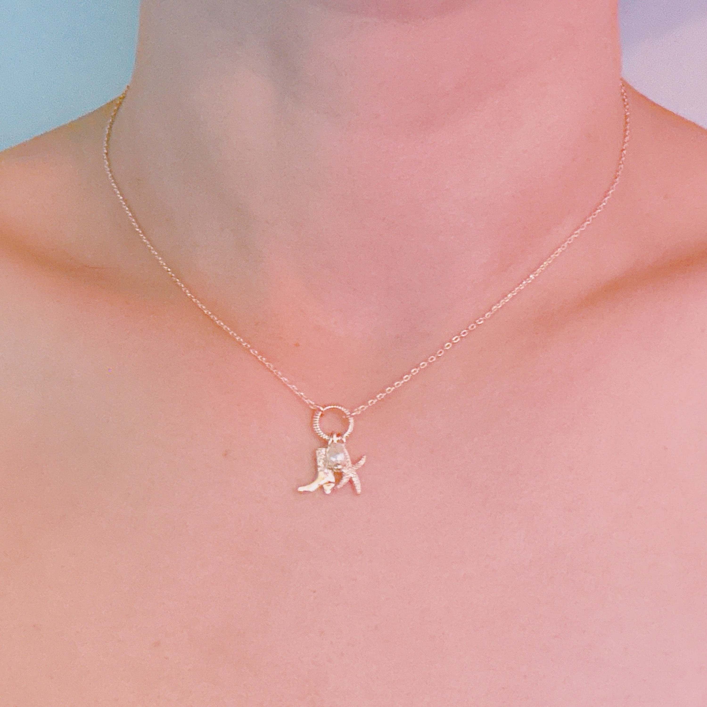 Coastal Cowgirl Necklace – Gold-Tone Chain with Starfish and Western